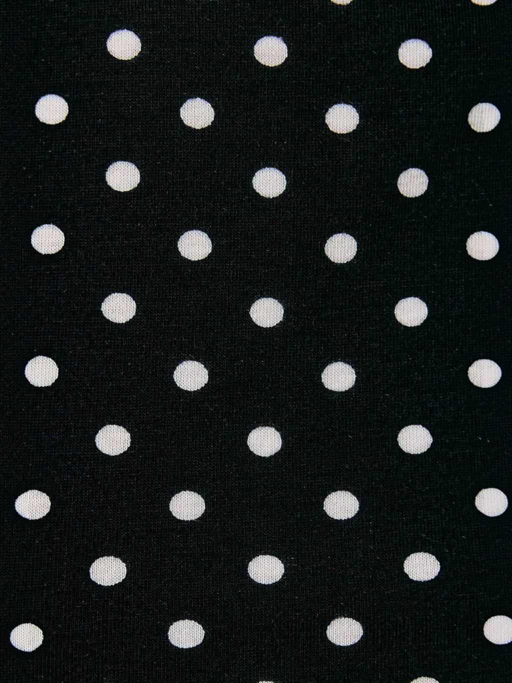 Mialur Boutique Luna Polka Dot Pants black stretch knit fabric with an evenly spaced white polka dot print