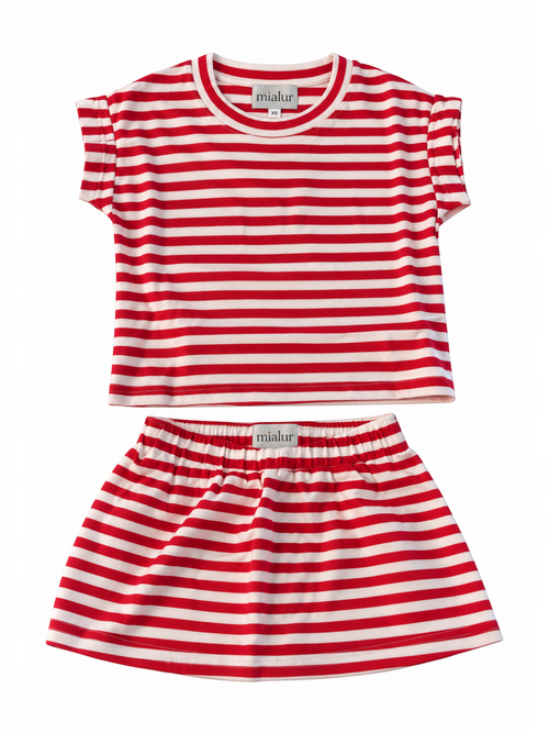 A two-piece children's outfit set by the brand Mishur, featuring a short-sleeve top and matching skirt in a red and white horizontal striped pattern, displayed on a clean white background.