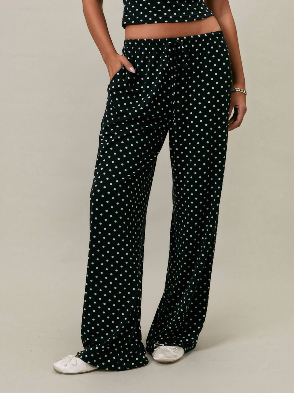Mialur Boutique Luna Polka Dot Pants in black and white, full-length wide-leg pants with elastic drawstring waistband, side pockets, and all-over polka dot print