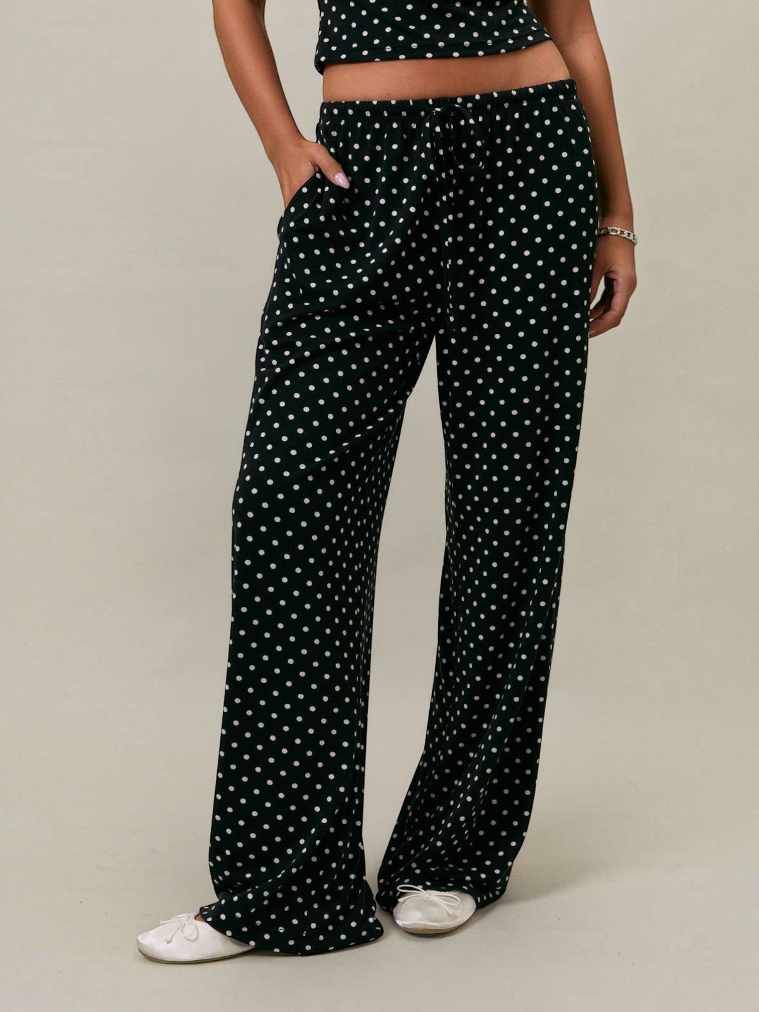 Mialur Boutique Luna Polka Dot Pants in black and white, full-length wide-leg pants with elastic drawstring waistband, side pockets, and all-over polka dot print