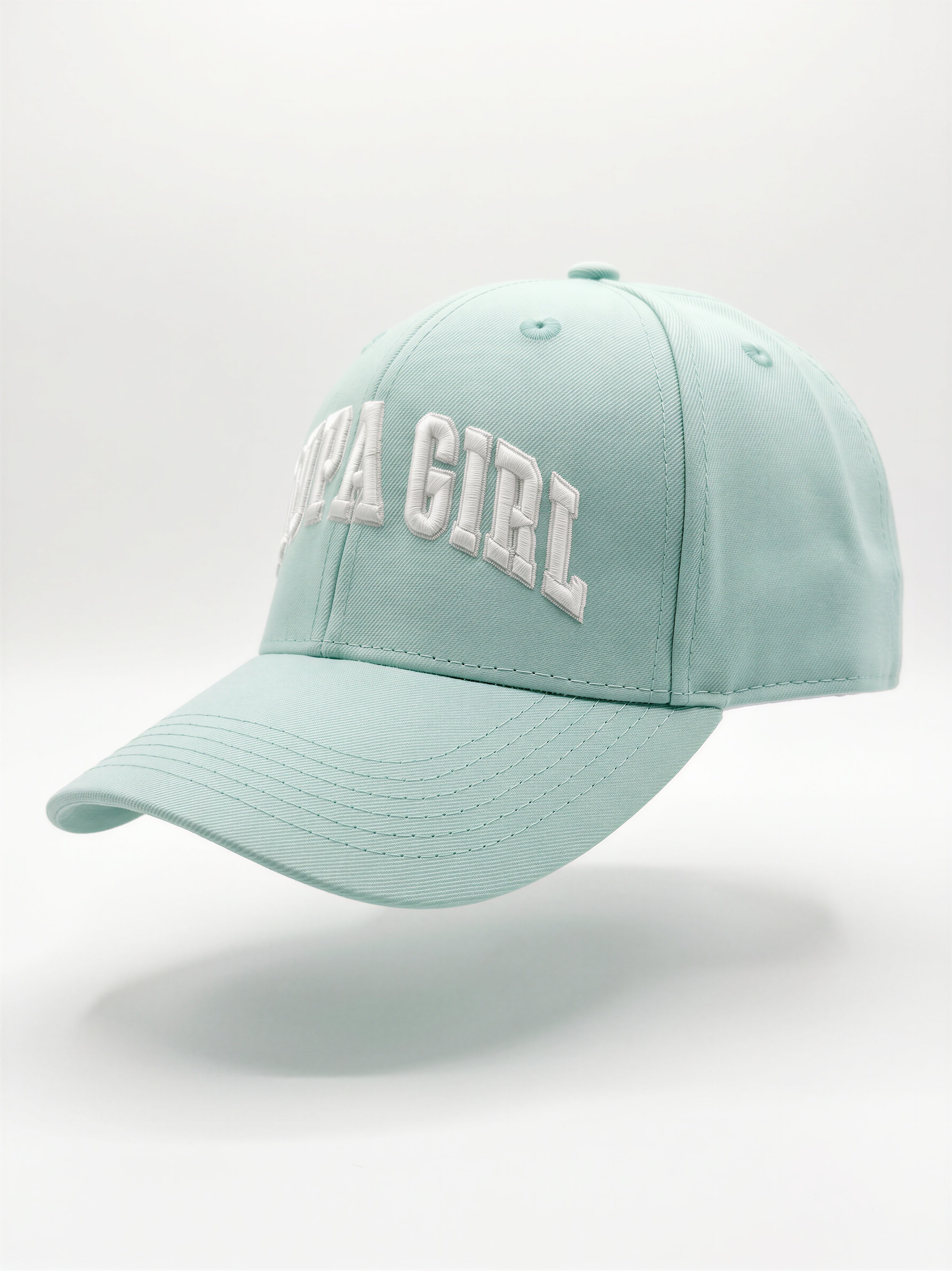 Mialur Boutique - A light mint green baseball cap with 'SEA GIRL' embroidered in white arched letters on the front, shown against a clean white studio background.