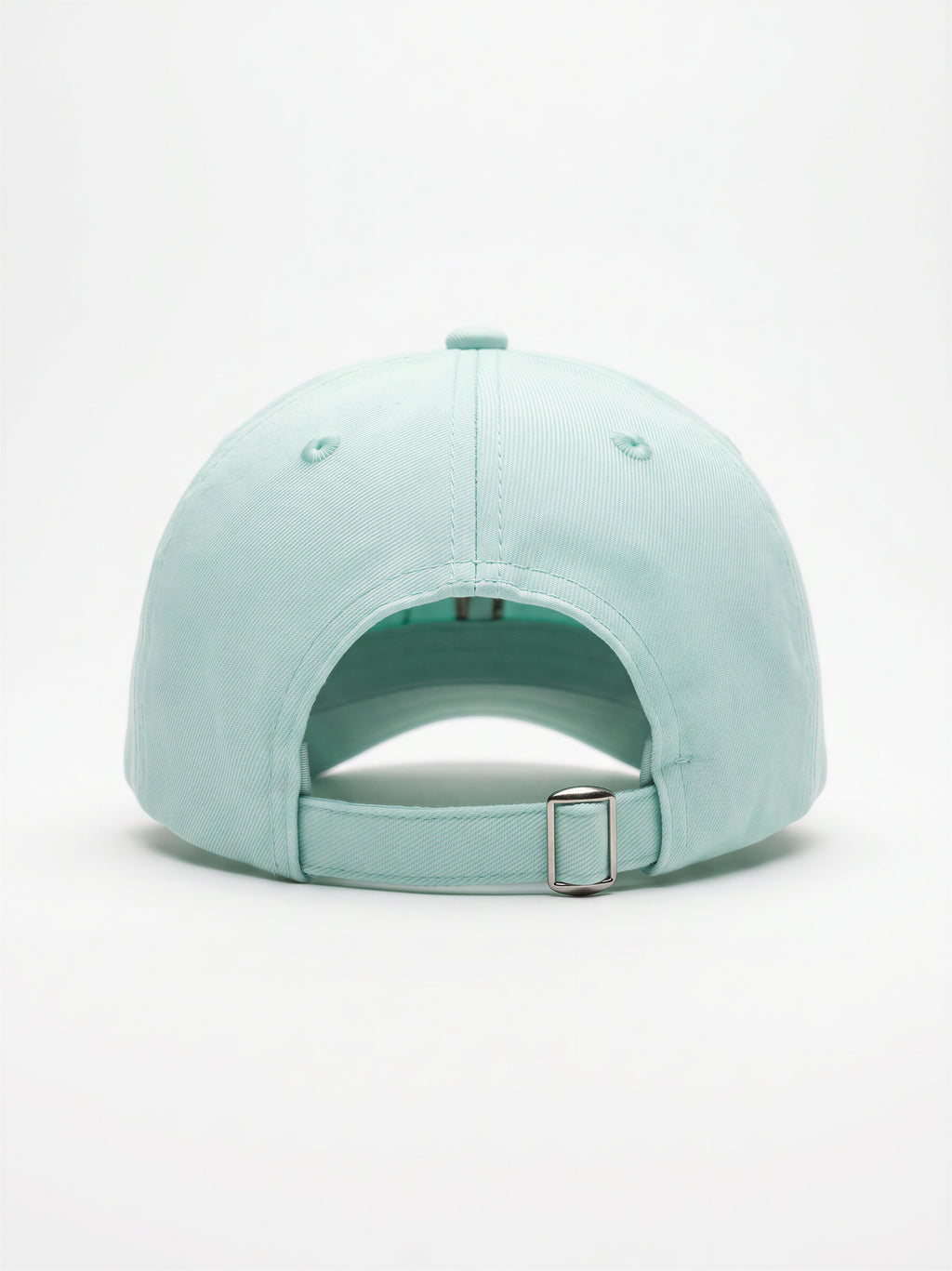 Mialur Boutique - A mint green baseball cap shown from the back, featuring a curved crown, ventilation eyelets, and an adjustable strap with a silver metal buckle, set against a plain white background.