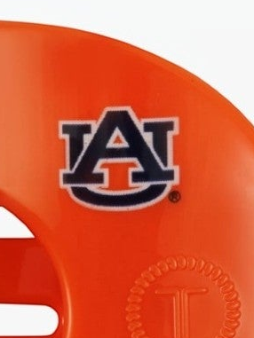 Mialur Boutique - Close-up of an orange plastic item featuring the Auburn Tigers 'AU' logo in navy blue and white, with a circular embossed 'T' below.