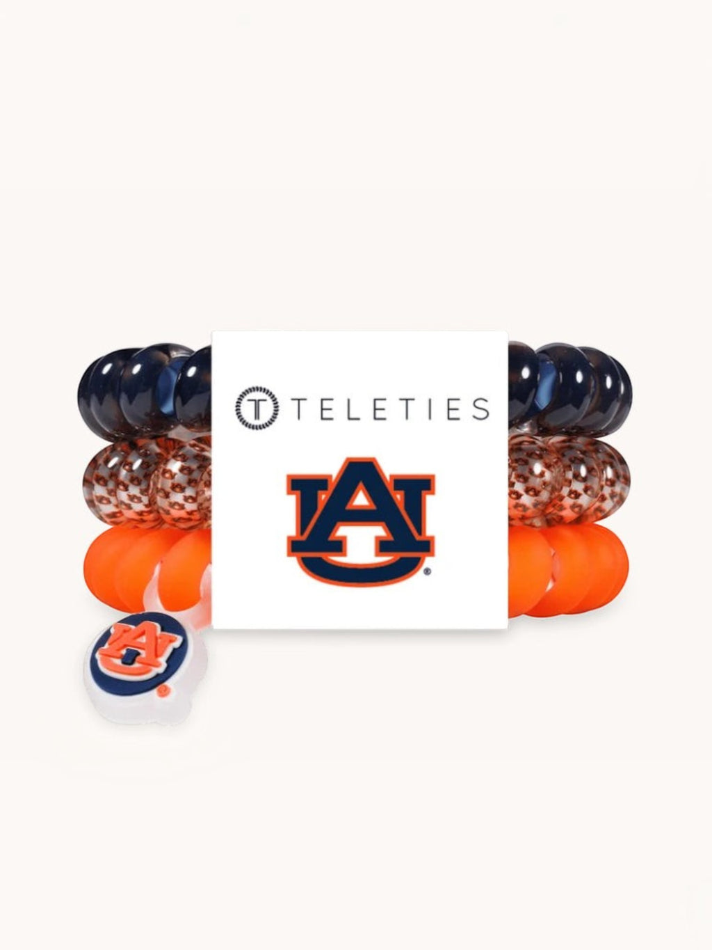 Mialur TELETIES Auburn University hair ties in orange and navy with a team logo charm on a white display card