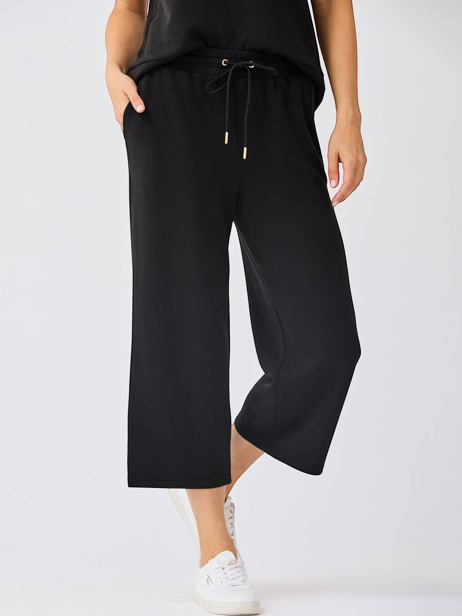 Mialur Avery black cropped wide-leg pants in soft modal blend with an adjustable drawstring waist and side pockets.