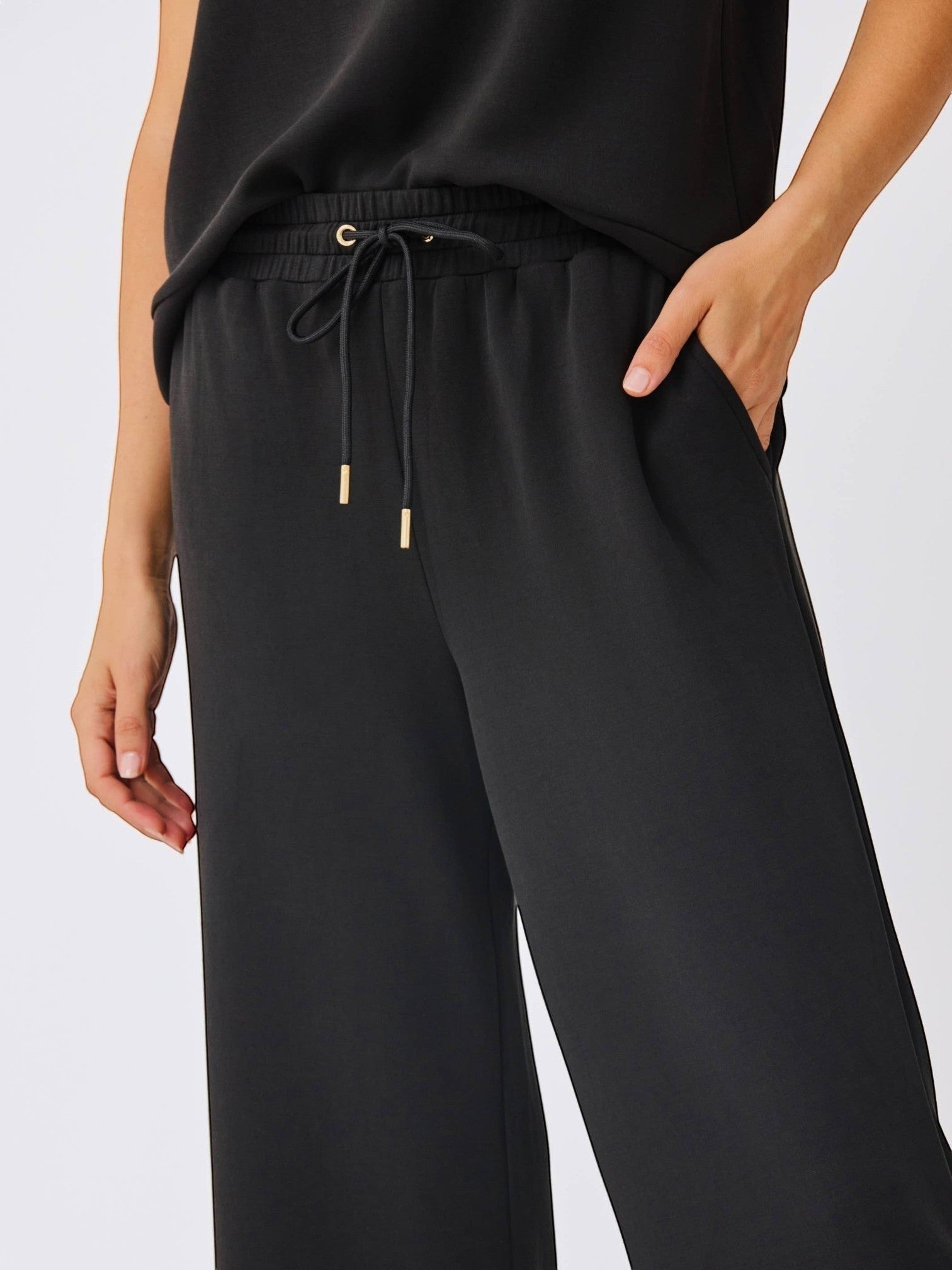 Mialur black Avery cropped wide-leg pants in soft modal blend with an adjustable drawstring waistband and side pockets.