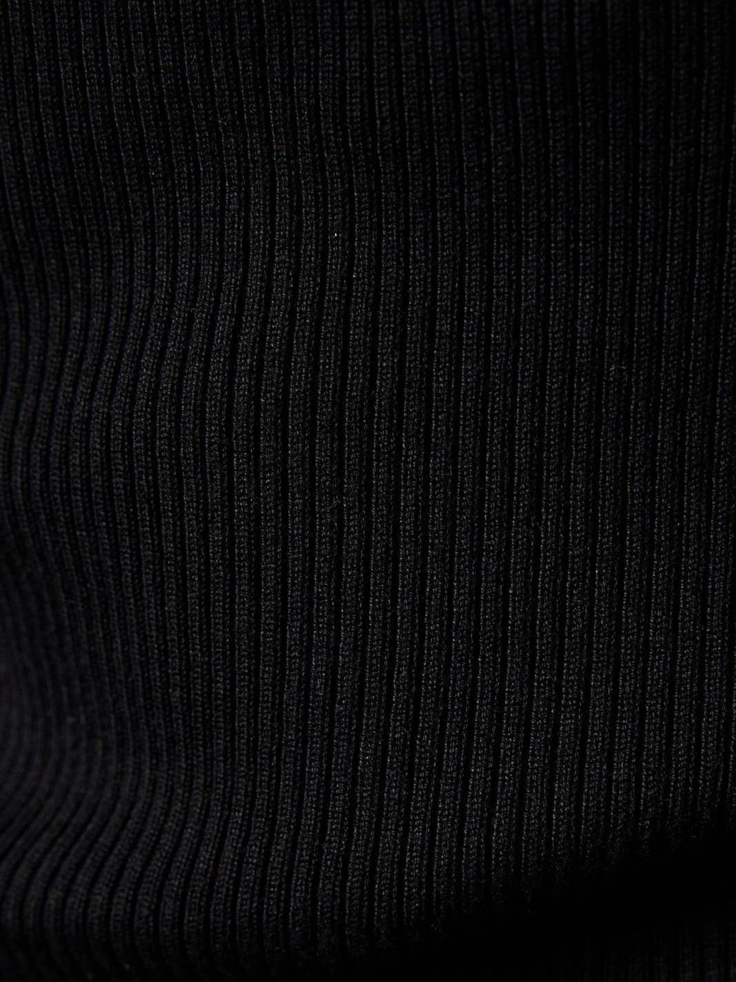 Close-up of the Mialur black ribbed fabric texture on the Essential Halter Top, showing soft vertical knit details.