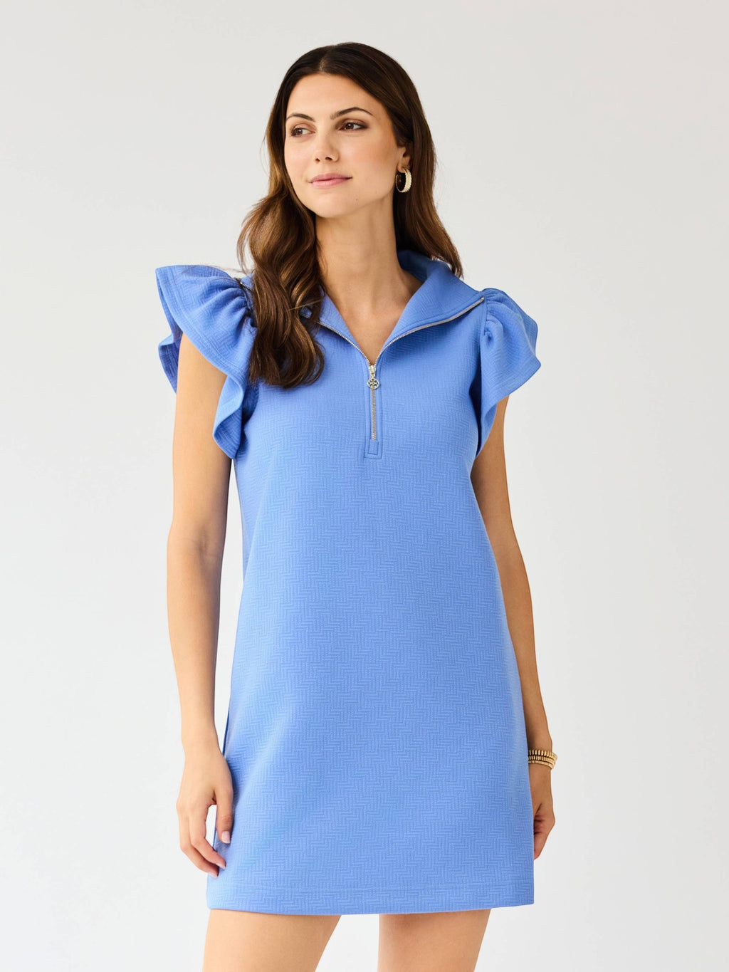 Model wearing a Mialur light blue mini dress with flutter ruffle sleeves, a half-zip collar, and textured fabric.