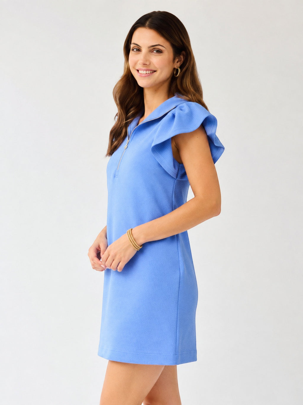 Mialur light blue mini dress with flutter ruffle sleeves, half-zip collar, and textured fabric on a smiling model.
