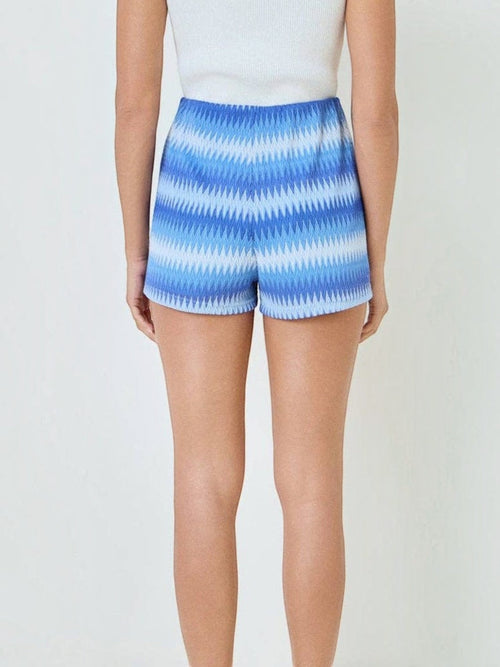 Mialur high-waisted summer shorts in a blue and white wave-inspired pattern, shown from the back view.
