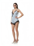 Mialur Bluebell Romper in blue and white vertical stripes with black lace trim, adjustable straps, and V-neckline.