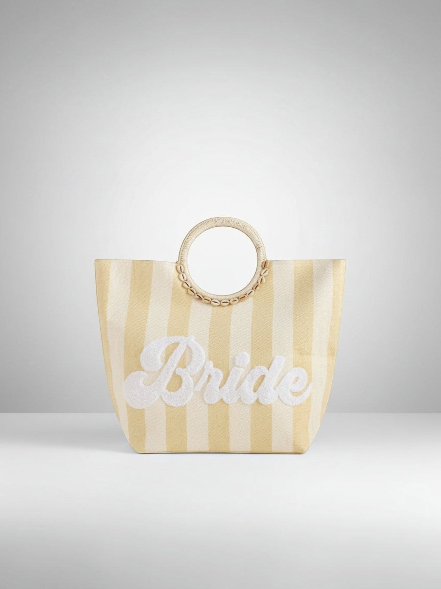 Mialur cream and soft yellow striped straw tote bag with Bride embroidery and shell-accented round handles