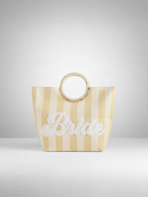 Mialur cream and soft yellow striped straw tote bag with Bride embroidery and shell-accented round handles