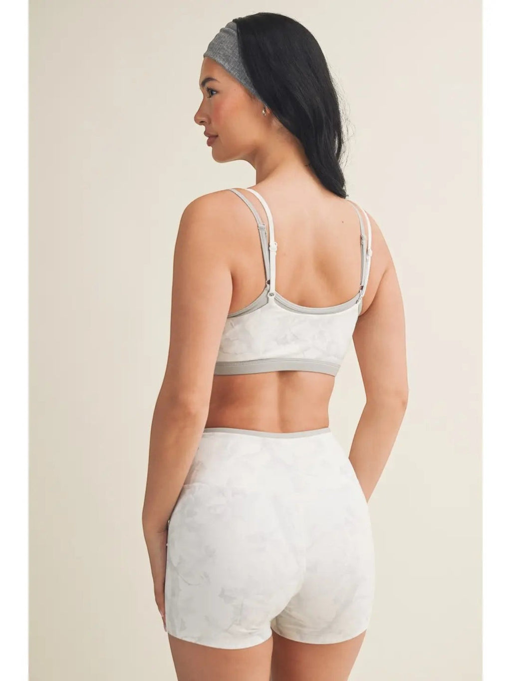 Mialur gray and white camo print double-layered sports bra with thin straps and built-in shelf bra, back view.