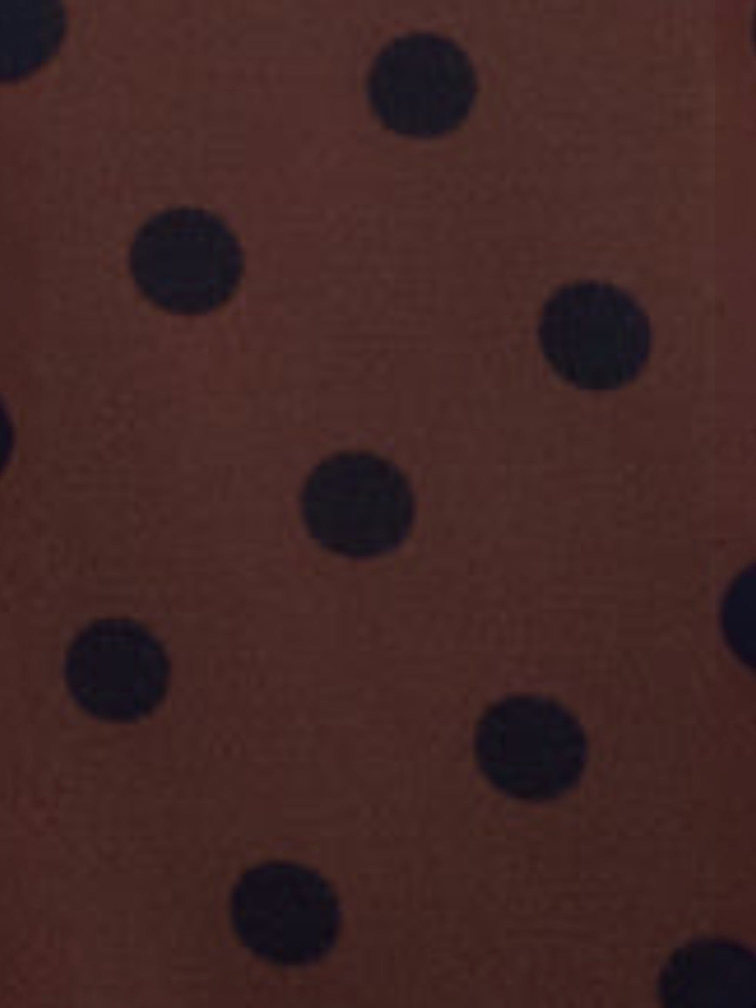 Mialur Cocoa Dot Lounge Set fabric featuring a chocolate brown base with black polka dots in 100% cotton