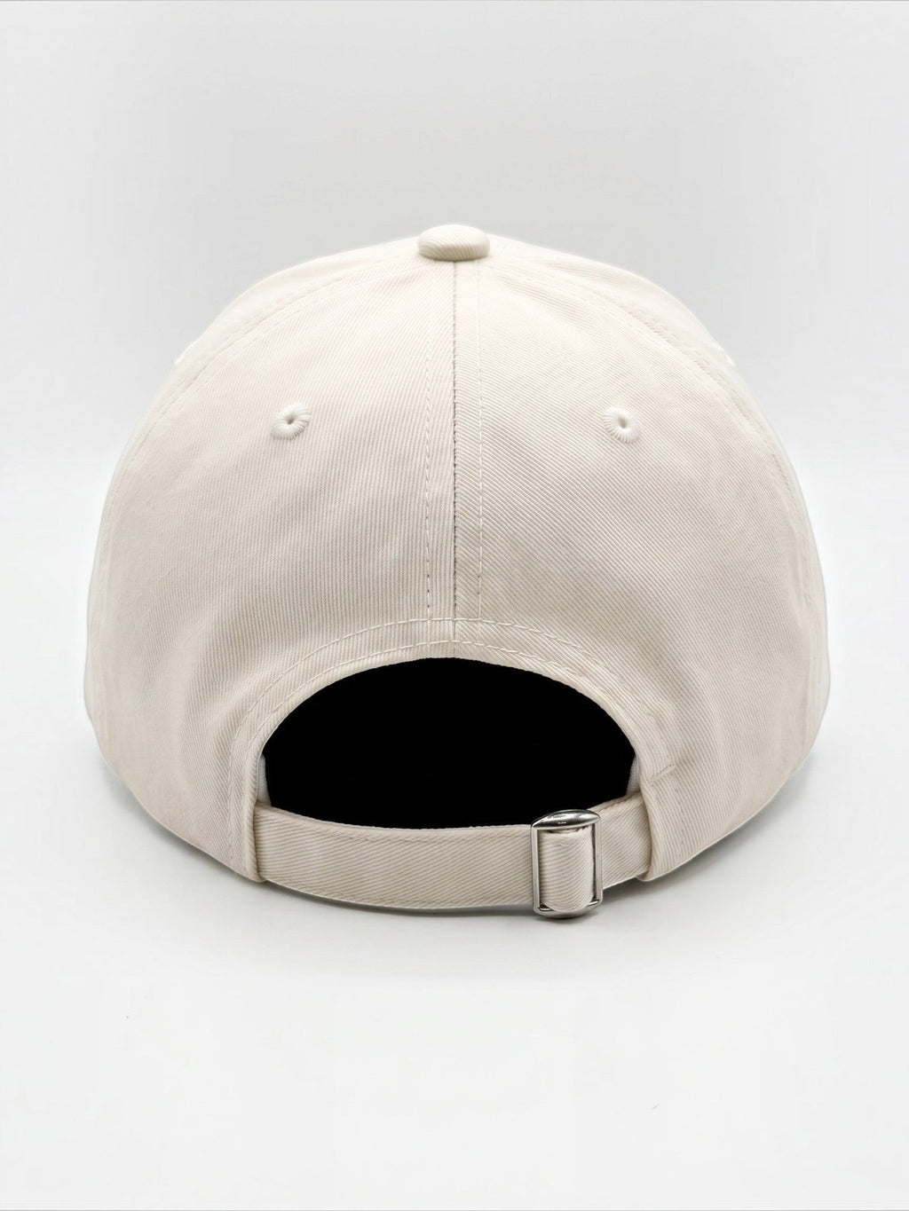 Back view of a cream Mialur baseball hat with an adjustable metal buckle strap closure on a white background.