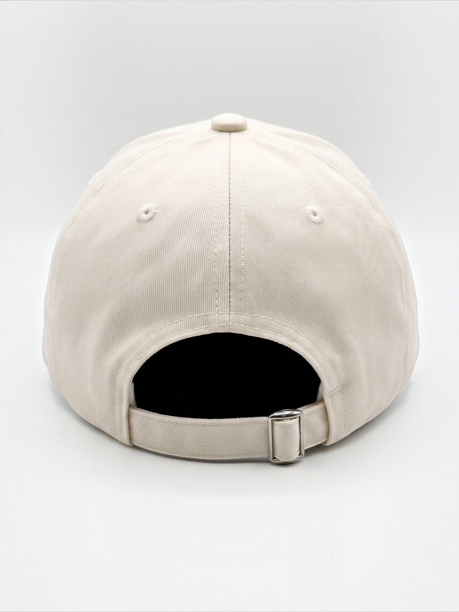 Back view of a cream Mialur baseball hat with an adjustable metal buckle strap closure on a white background.