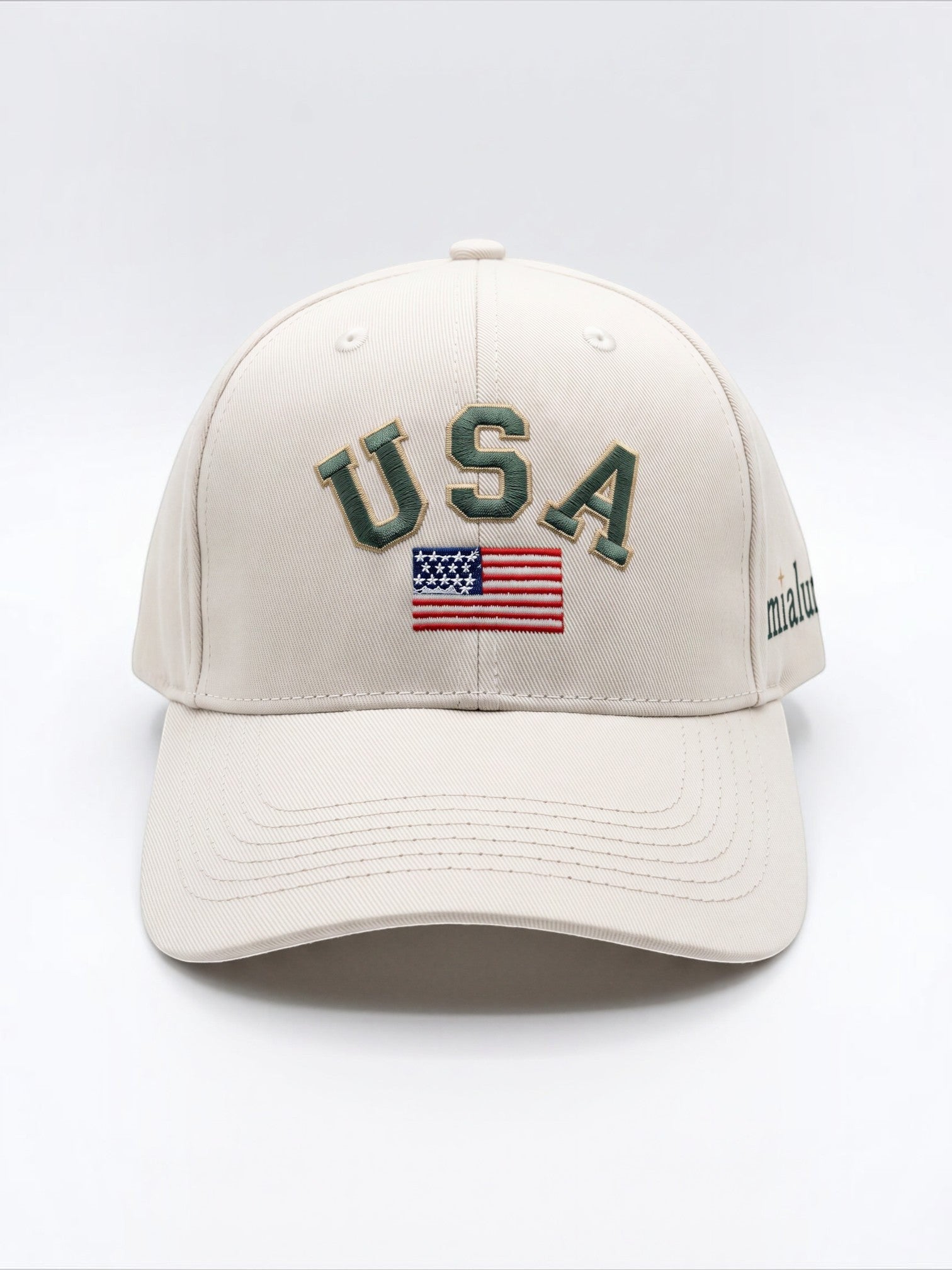 Mialur cream baseball cap with green USA embroidery and American flag detail on a curved brim