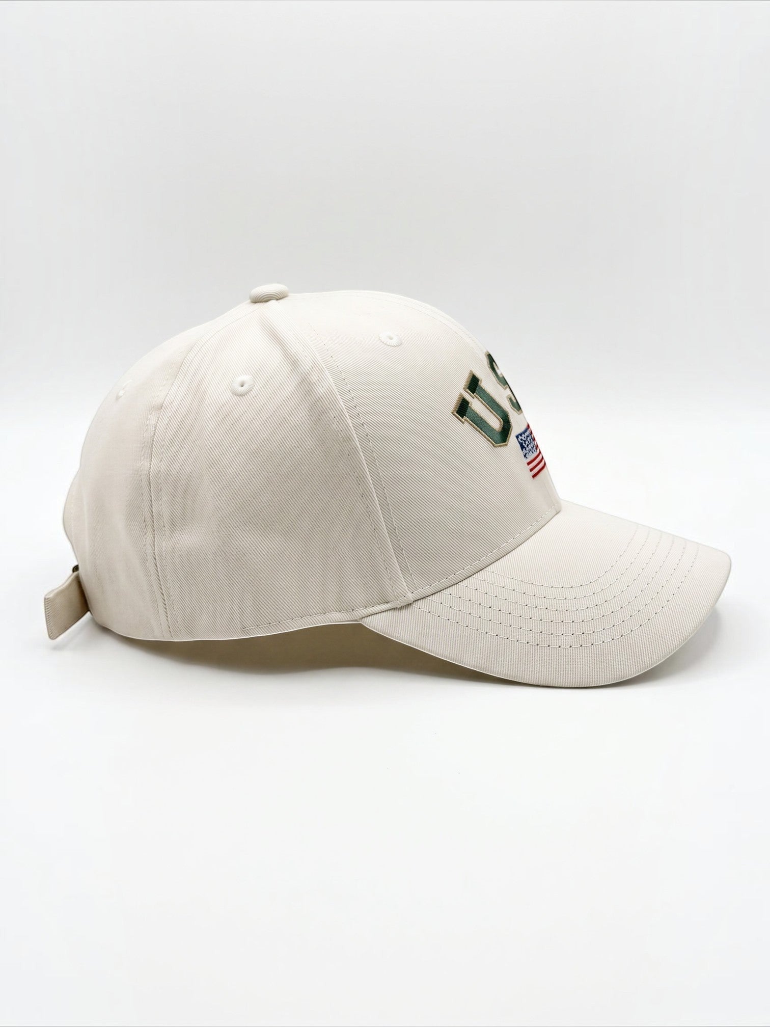 Mialur cream baseball hat with embroidered USA lettering and American flag detail on a curved brim
