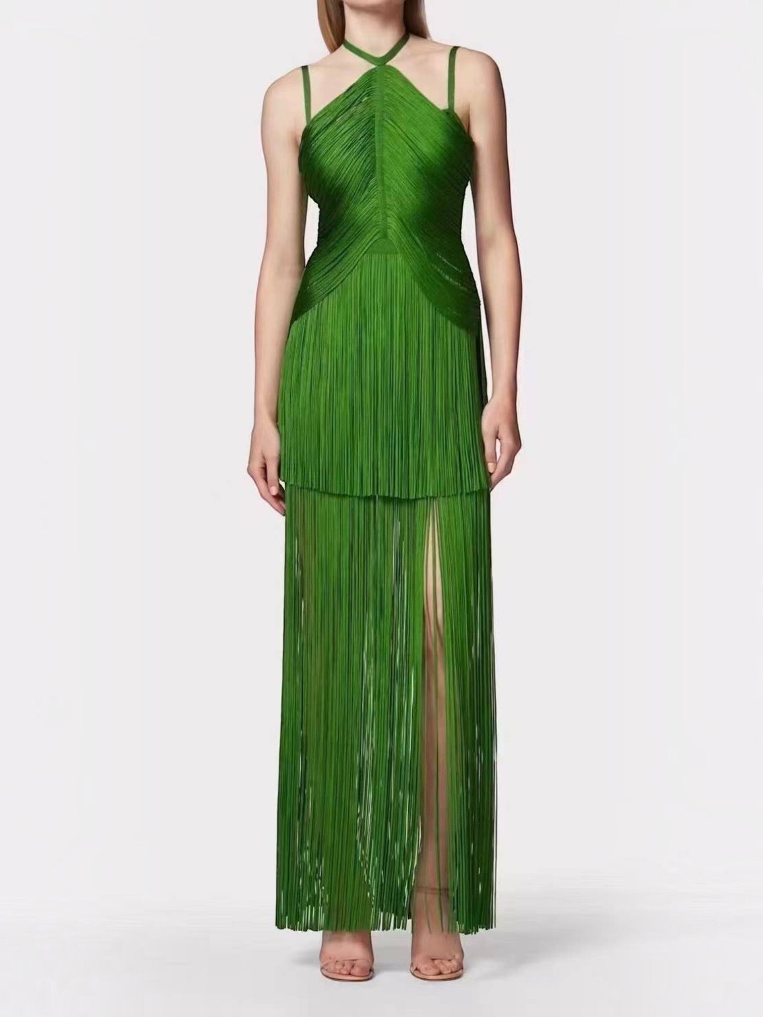 Mialur emerald green maxi dress with a halter neckline, fitted bodice, and a long fringe skirt with a high front slit.