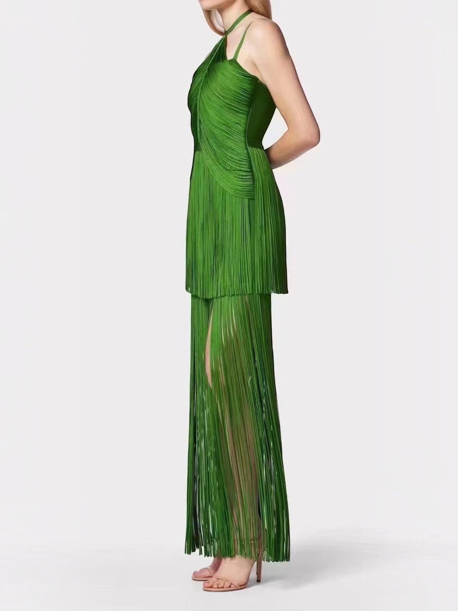 Mialur emerald green maxi dress with a halter neckline, fitted bodice, and a flowing pleated fringe skirt with a slit.