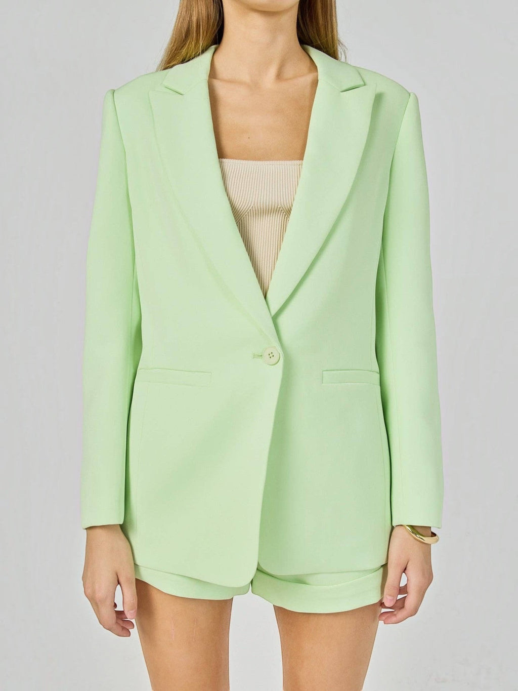 Mialur Florida Blazer in sugar lime light green with an oversized fit, classic lapel, and front pockets.