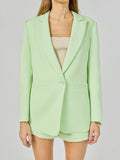 Mialur Florida Blazer in sugar lime light green with an oversized fit, classic lapel, and front pockets.