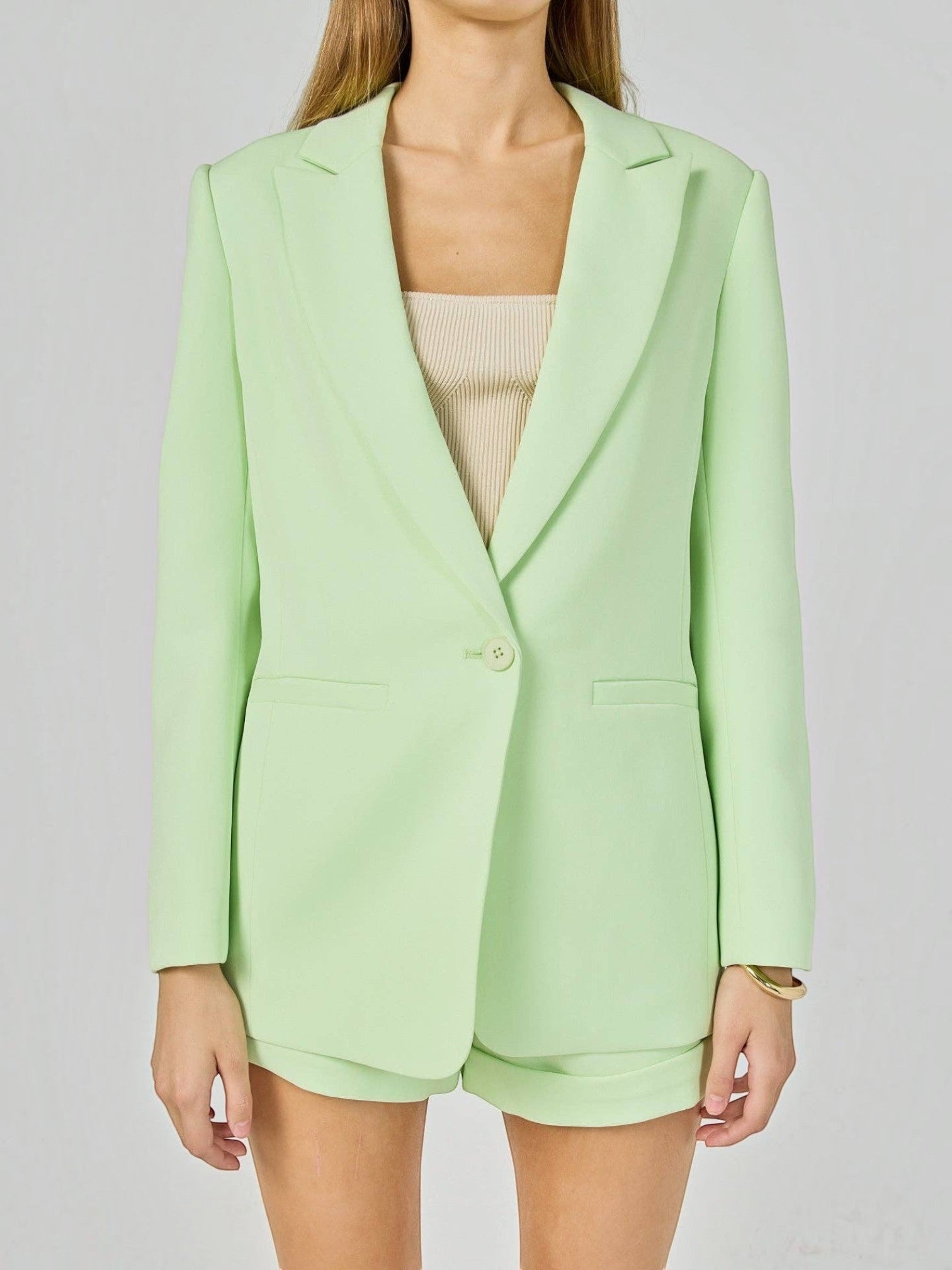 Mialur Florida Blazer in sugar lime light green with an oversized fit, classic lapel, and front pockets.