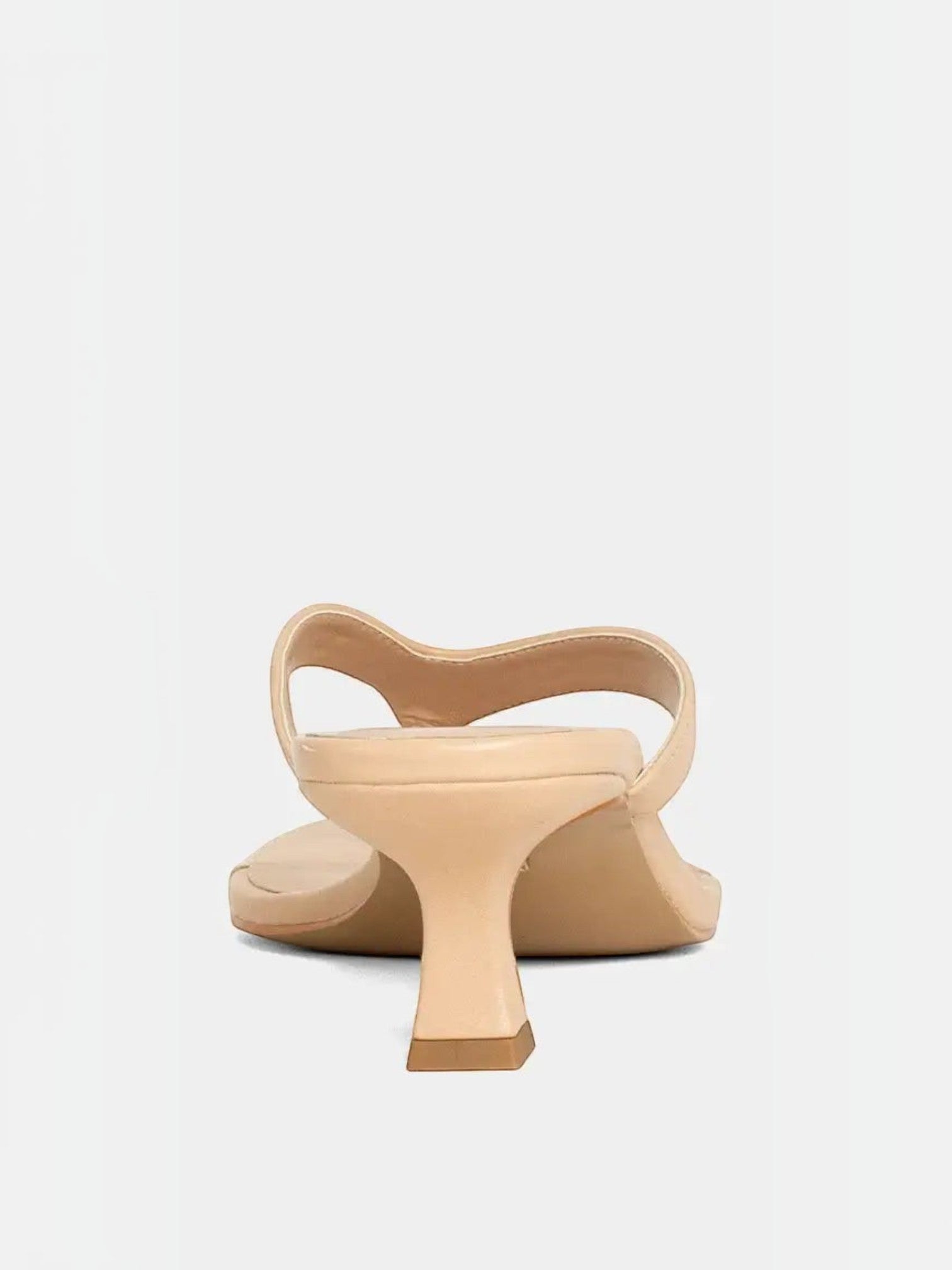 Mialur FRANNY nude thong heels featuring a minimalist slip-on design with a sculpted mid-height heel and square toe.