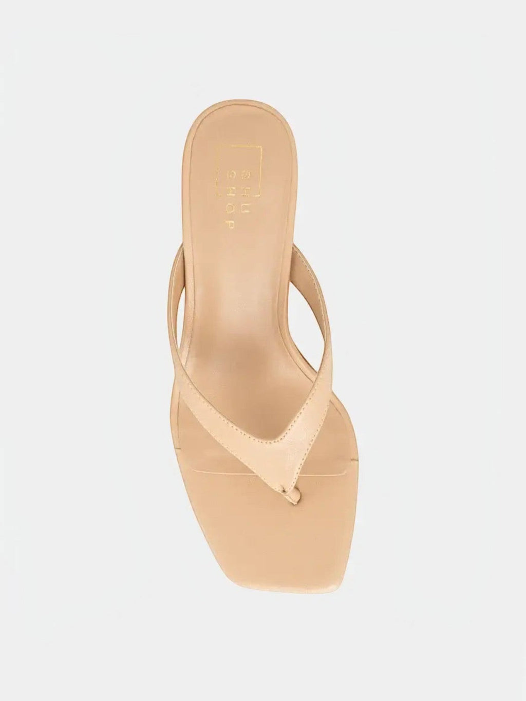 Mialur FRANNY nude thong heels featuring a minimalist square open toe and a sleek sculpted mid-height heel.