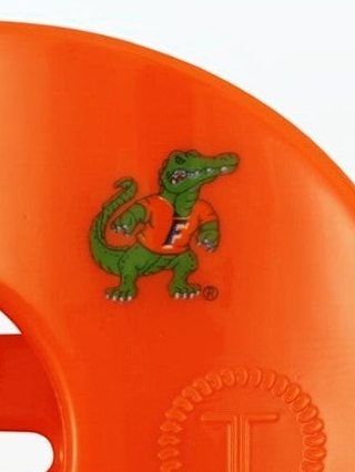Mialur Boutique - Close-up of an orange plastic stadium-style seat featuring a green Florida Gators mascot graphic wearing an orange jersey with a white 'F'.