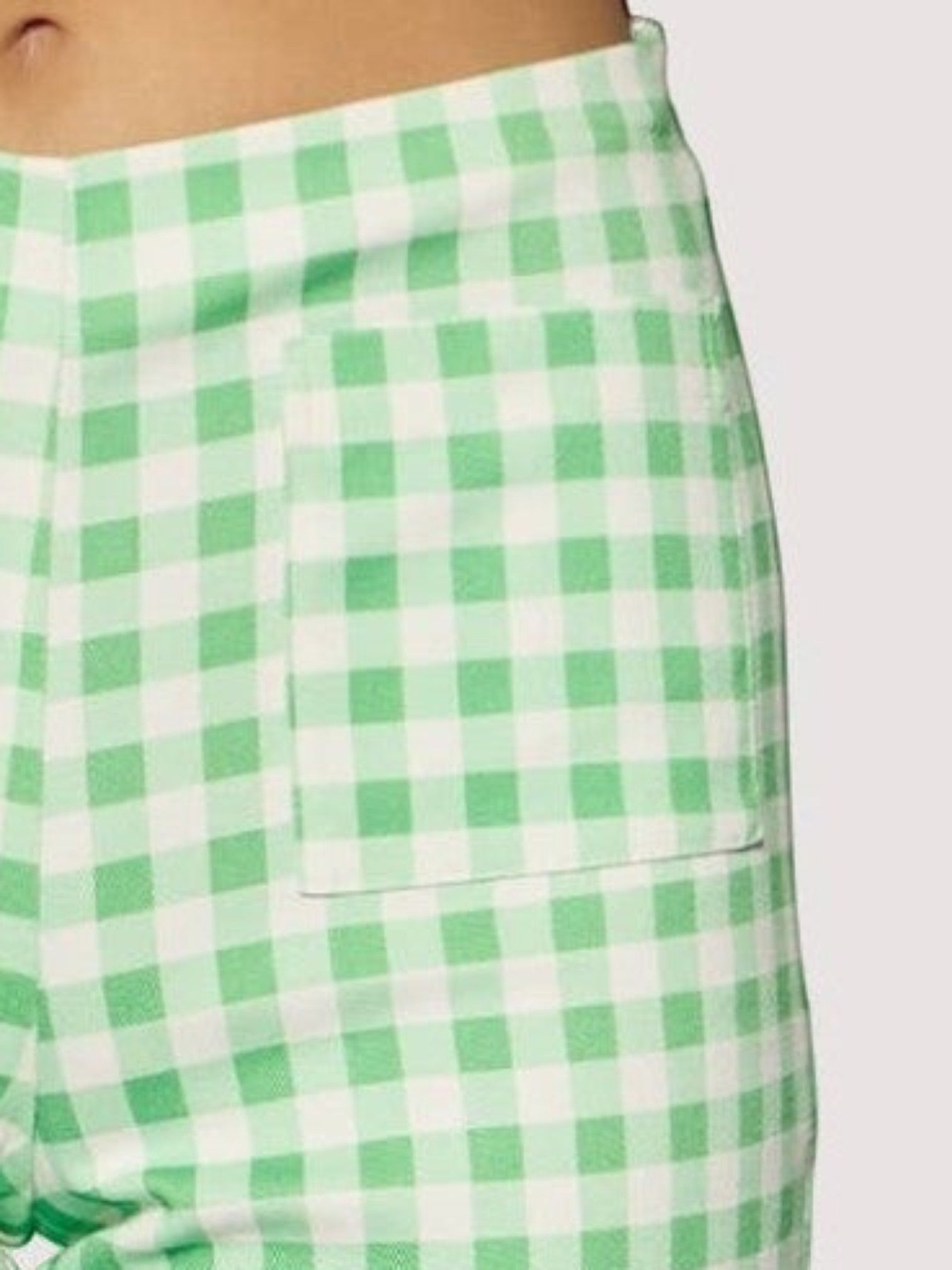 Mialur green and white gingham print capri pants featuring a functional front patch pocket and fitted waistband.