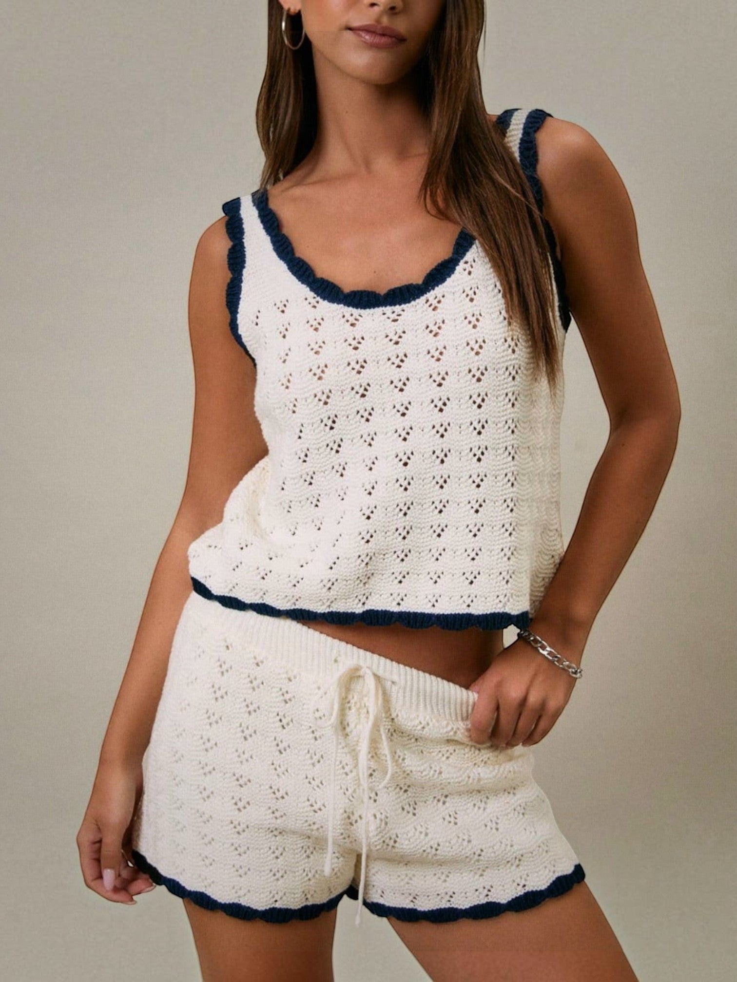 Mialur Harbor Knit Shorts in neutral knit fabric with navy contrast trim and drawstring waist on a model