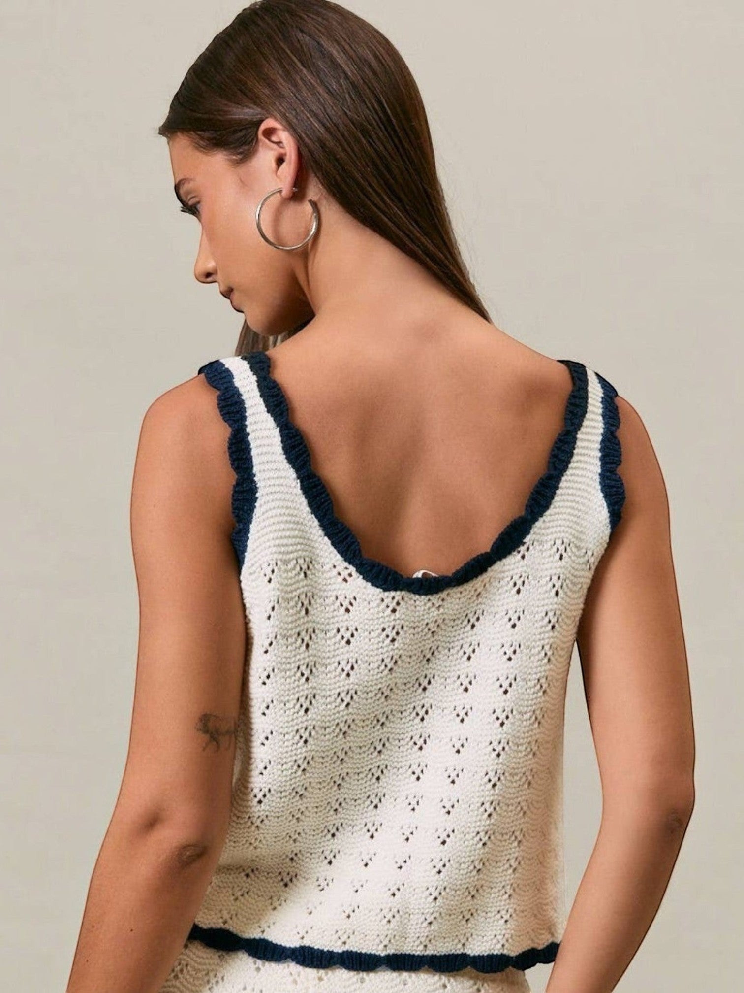 Mialur Harbor Knit Top in white with navy contrast trim, featuring a sleeveless open-knit design for coastal style.