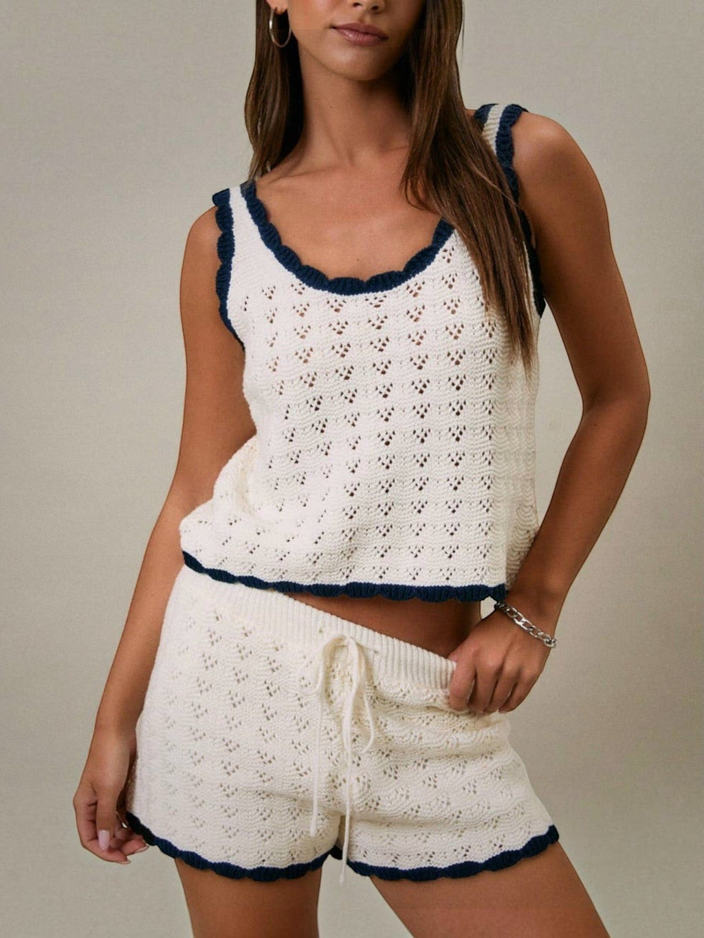 Mialur Harbor Knit Top in white open-knit fabric with navy blue contrast trim, worn as a sleeveless summer set.