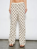 Mialur Harper low-rise wide-leg pants in cream with chocolate brown polka dots, featuring an elastic waistband.