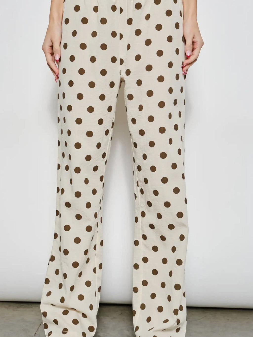Mialur Harper Polka Dot Pants in cream with chocolate brown dots, featuring a relaxed wide-leg fit and side pockets.