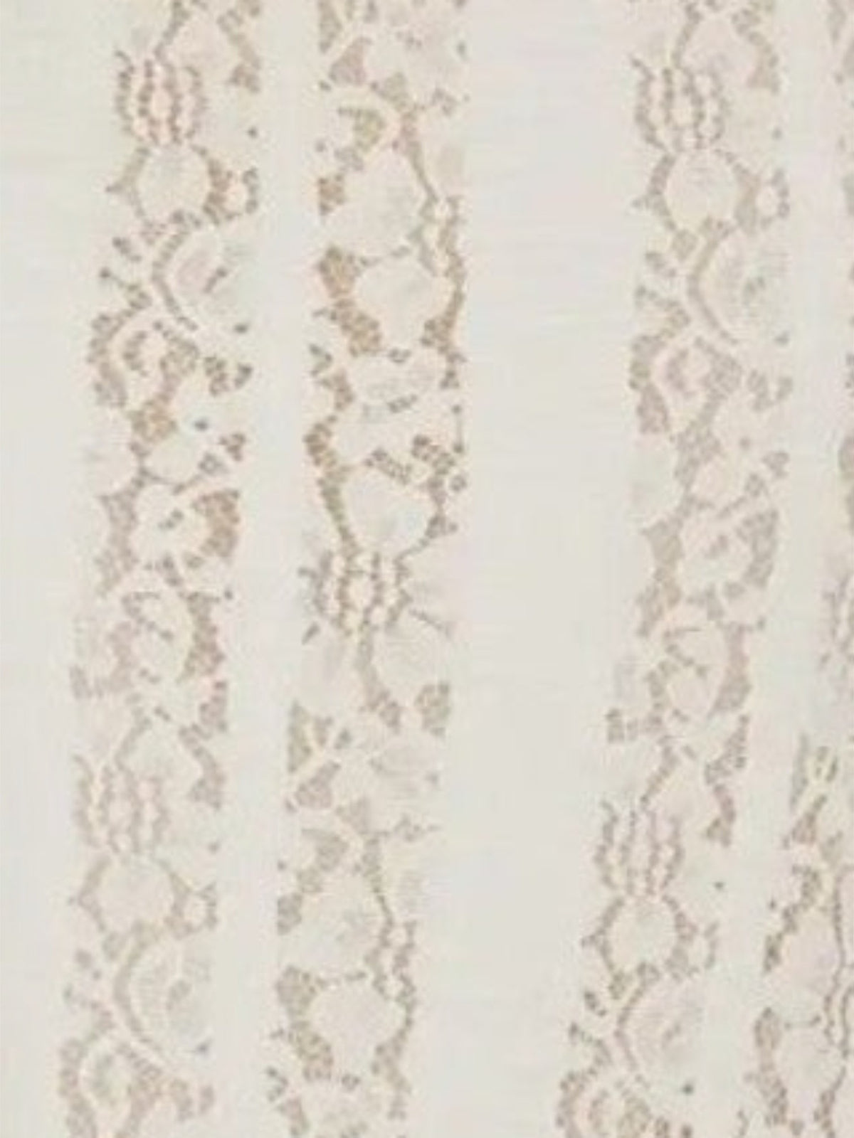 Close-up of Mialur ivory lace fabric with delicate vertical floral patterns on a soft white background.