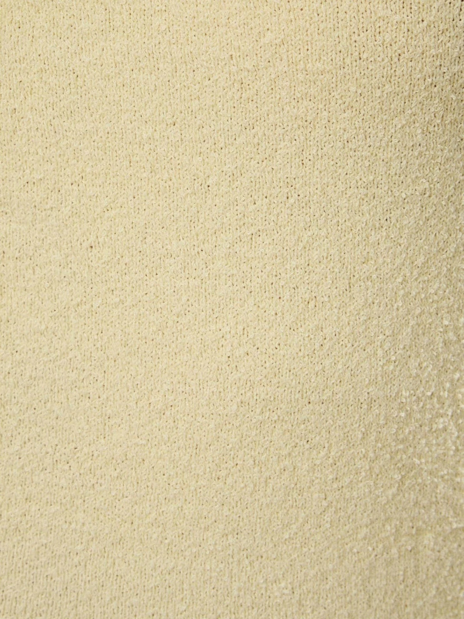 Close-up of the soft limoncello yellow luxury knit fabric of the Mialur Limoncello Knit Midi Dress