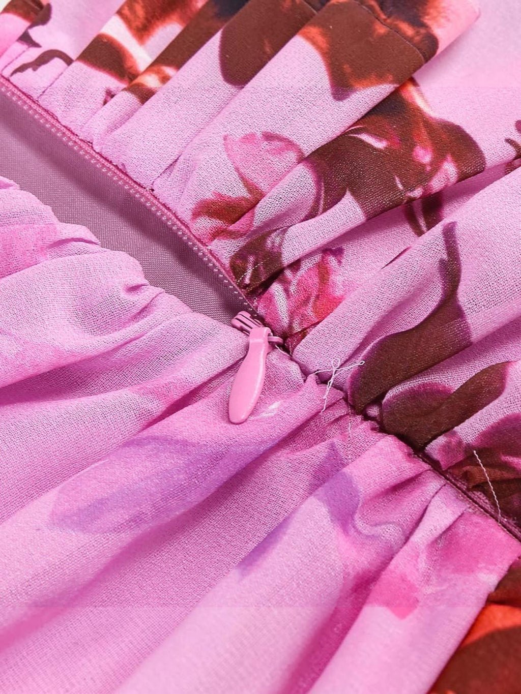 Mialur pink floral maxi dress featuring a concealed zipper closure and delicate gathered ruffle fabric detail.