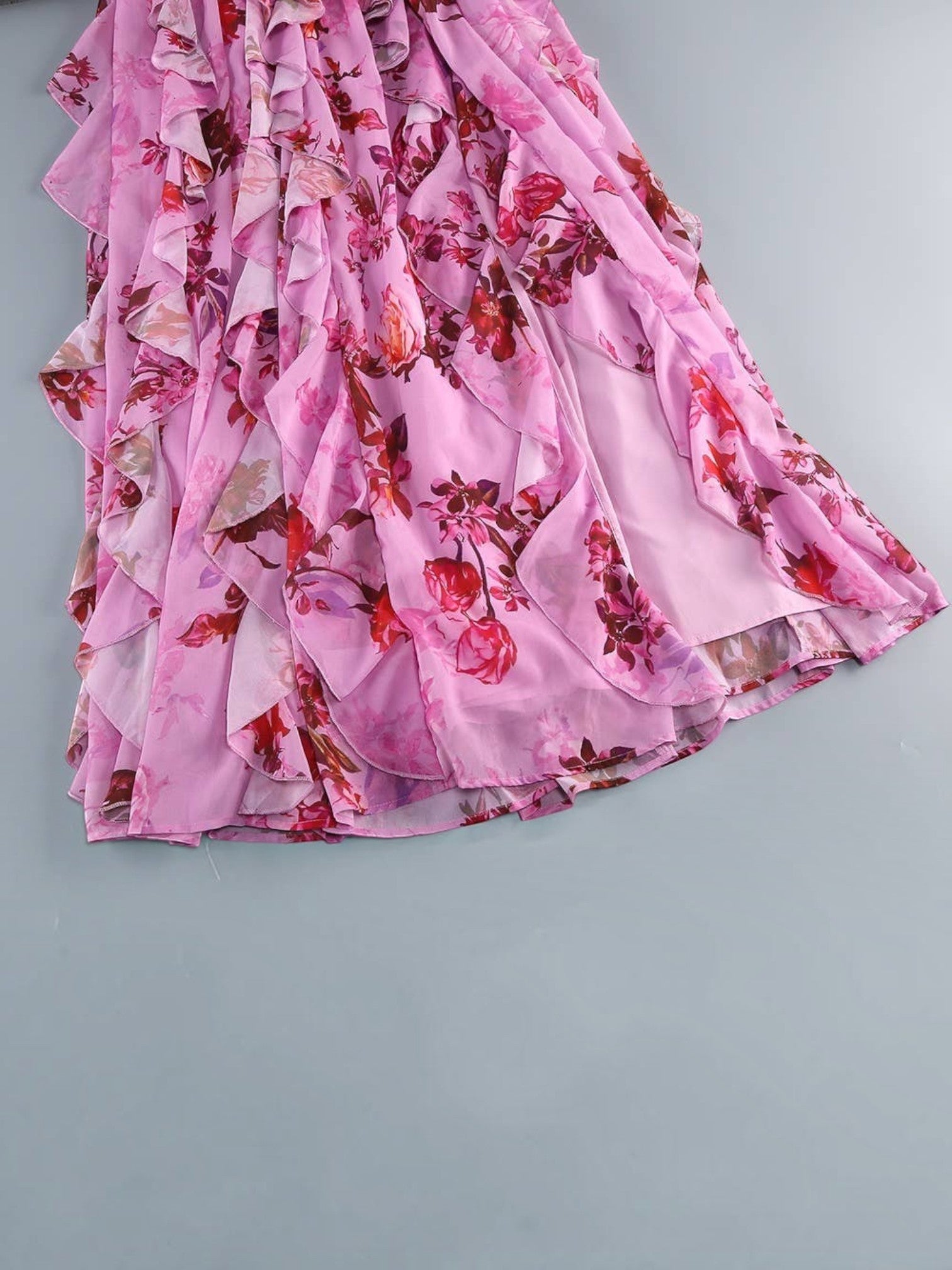 Mialur pink floral maxi dress featuring cascading tiered ruffles and lightweight fabric on a grey background