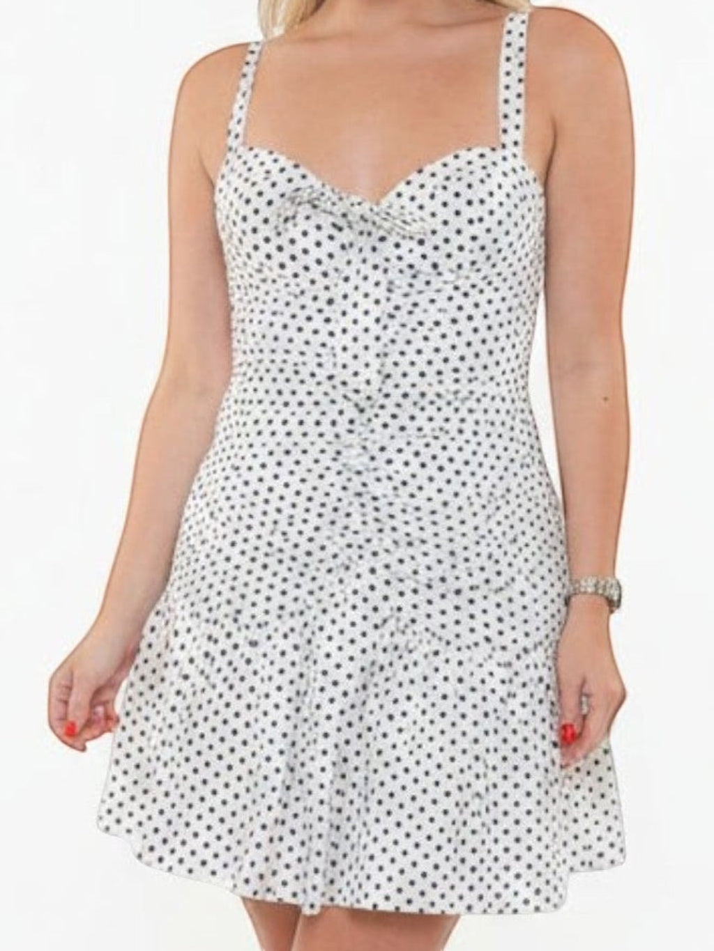 Mialur white and black polka dot mini dress with a sweetheart neckline, ruched bodice, and front bow detail.