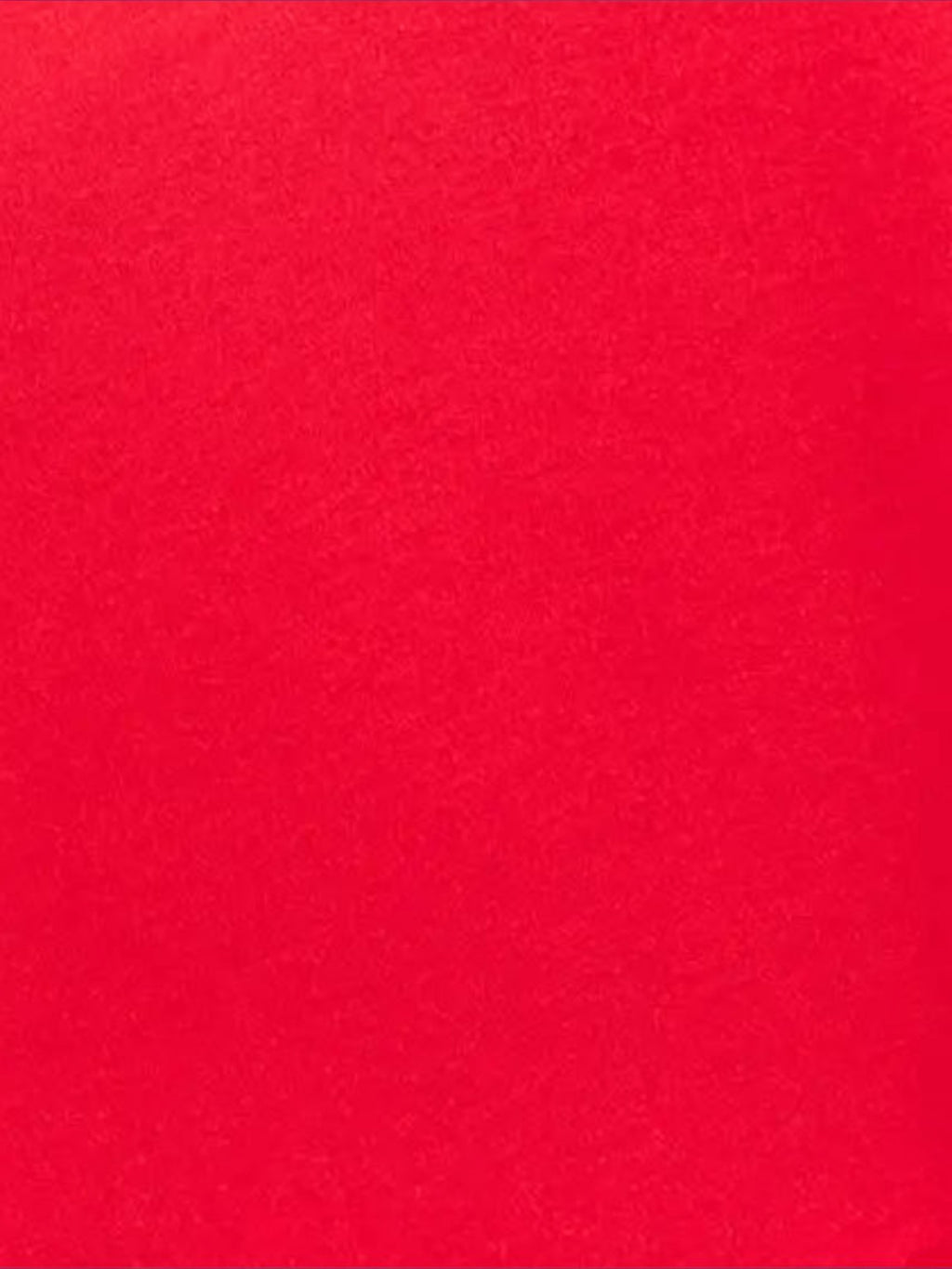 Close-up of the vibrant red fabric texture of the Mialur Festive Picnic Red Dress.