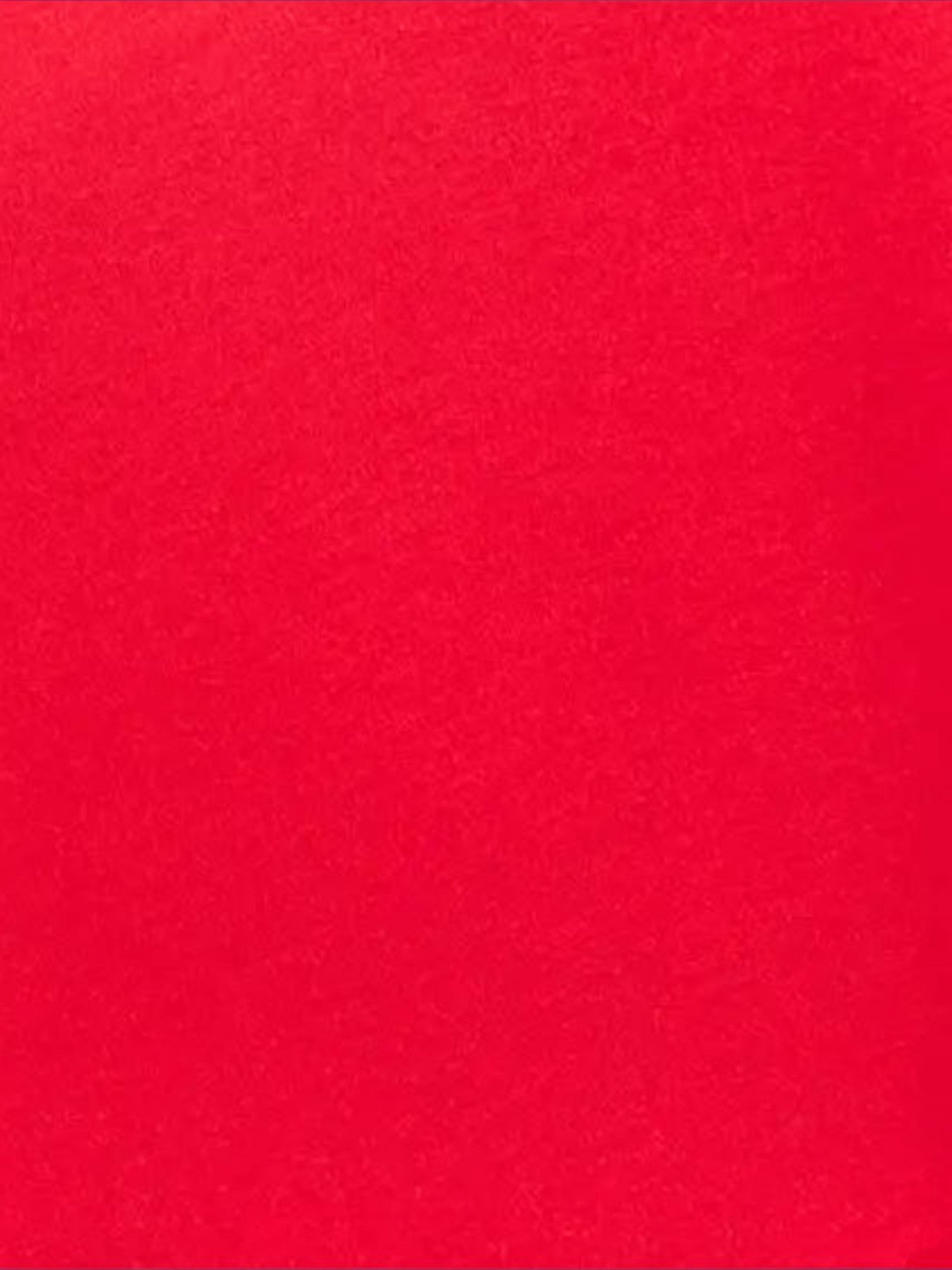 Close-up of the vibrant red fabric texture of the Mialur Festive Picnic Red Dress.