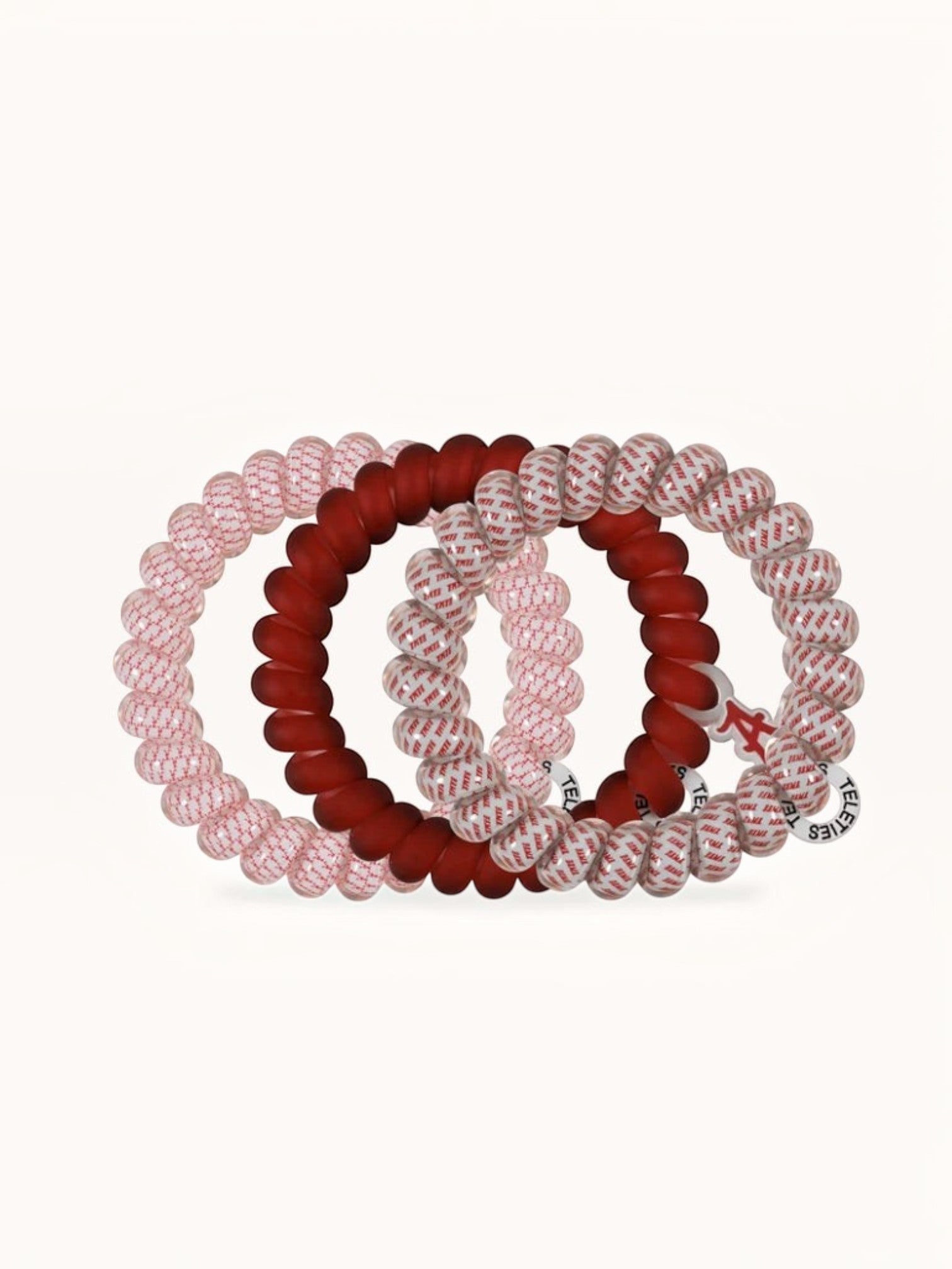 Mialur Roll Tide spiral hair ties in crimson and white patterns, designed for a strong, damage-free hold.
