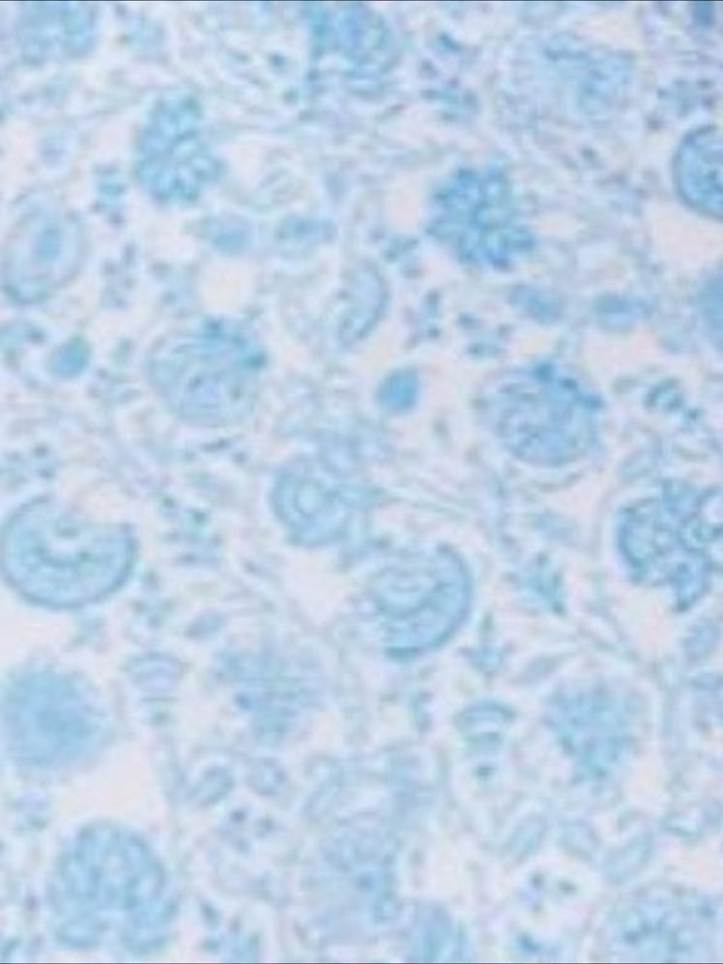 Mialur Santorini one-piece swimsuit fabric featuring a delicate blue and white floral print pattern.