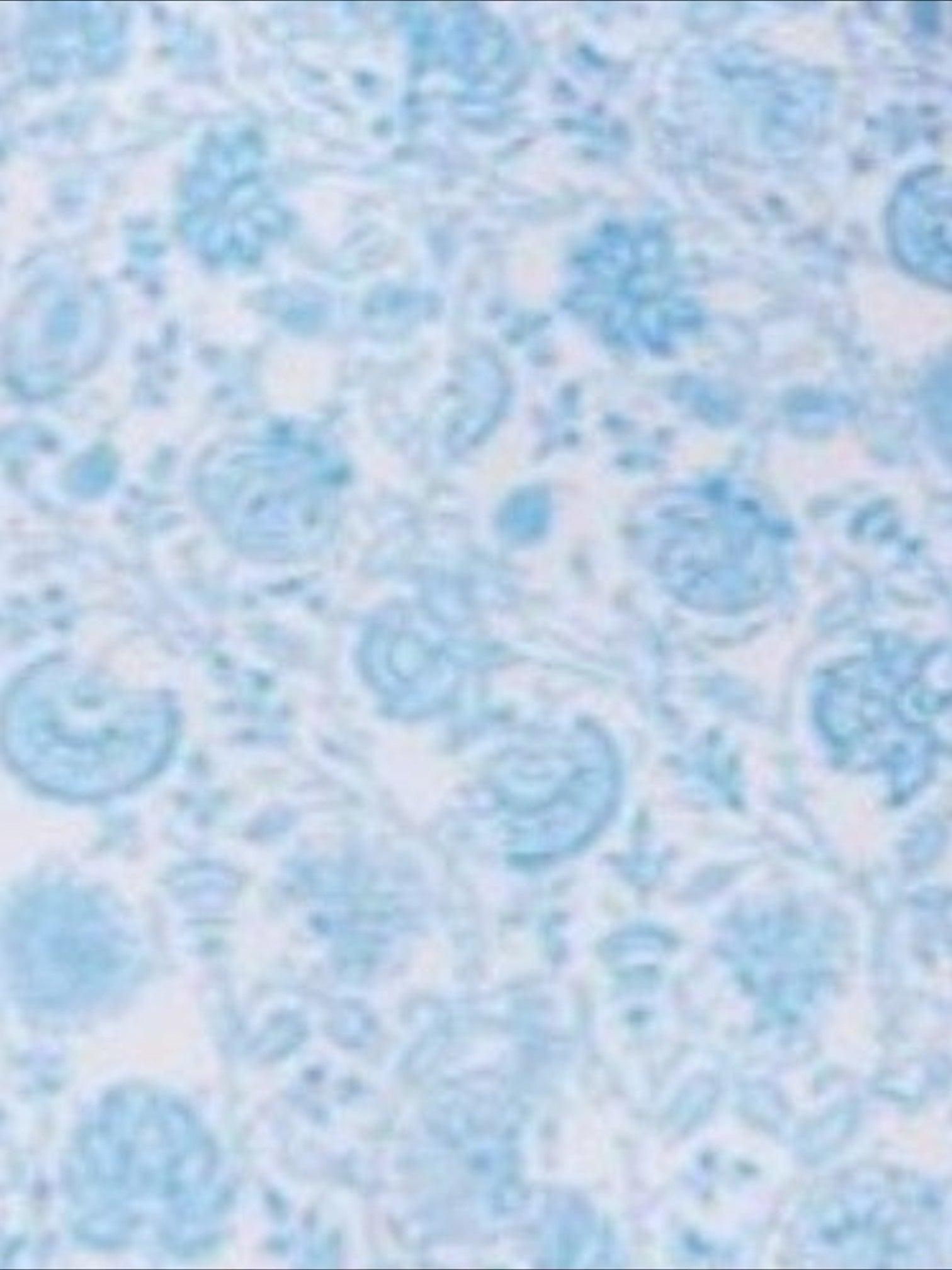 Mialur Santorini one-piece swimsuit fabric featuring a delicate blue and white floral print pattern.