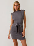 Mialur Sloane mini dress in chocolate brown knit with mock neck, structured shoulders, and a self-tie waist belt.