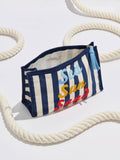 Mialur navy and white striped canvas zip pouch with colorful Sea Sun Sand embroidery and a blue tassel zipper pull.