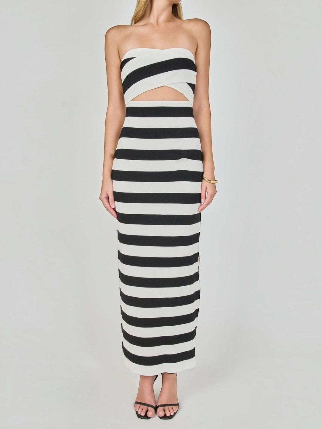Mialur strapless maxi dress in black and white horizontal stripes featuring a front waist cutout in stretchy knit